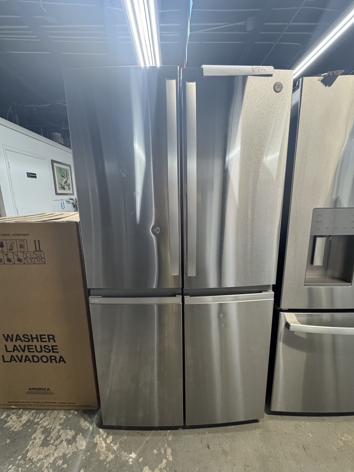 GE Profile PAD28BYTFS four-door refrigerator in fingerprint resistant stainless steel