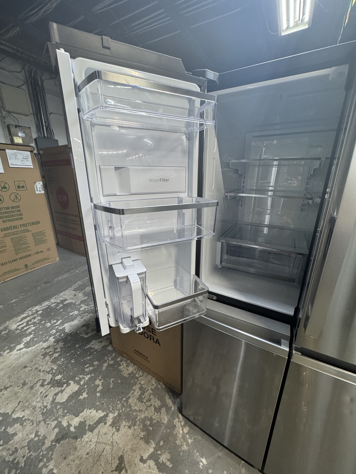 Small cosmetic dents on upper left refrigerator door